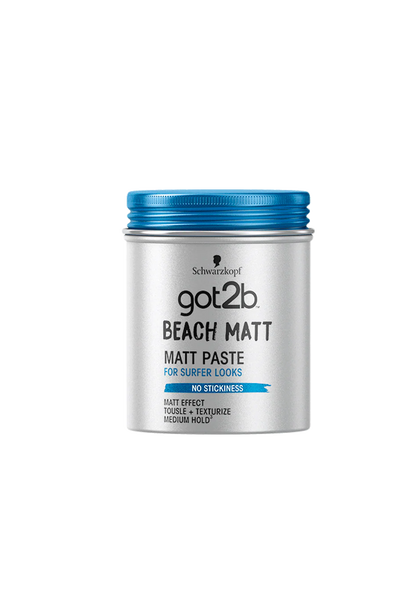 Schwarzkopf Got2B Beach Matt Paste (100ml) in a silver container with blue lid offers a matte finish, no stickiness, flexible medium hold, and texturizing for surfer-inspired looks.