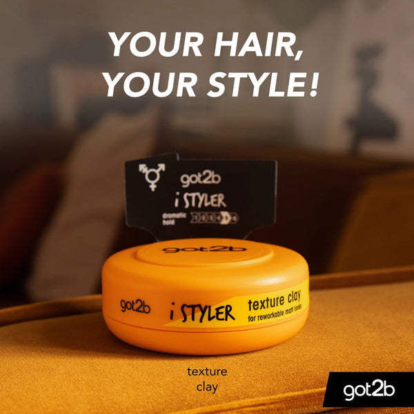 A container of Schwarzkopf Got2B iStylers Texture Clay (75ml) sits on a couch with a card. Text above says, YOUR HAIR, YOUR STYLE! Matte Finish and Flexible Hold appear below. The Schwarzkopf logo is in the bottom right corner.