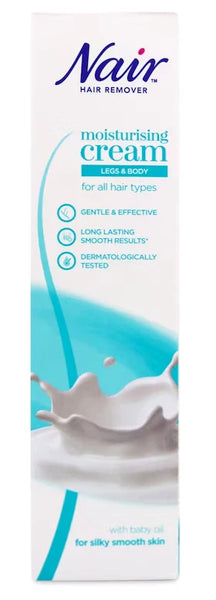 Front of a Nair Hair Remover Moisturising Cream for Legs and Body (100ml) box, showcasing gentle yet effective hair removal for smooth skin. Offers long-lasting results, dermatologically tested. Features blue swoosh and milk splash graphics.