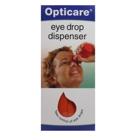 The image features the Opticare Eye Drop Dispenser package with a smiling user, highlighting its easy use. The blue and white packaging displays a red icon and the slogan Take control of eye drops, emphasizing effortless squeezing for hassle-free drop application.