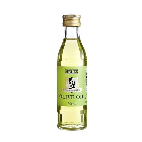 A small clear bottle contains 70ml of Bells Olive Oil from 121 Pharmacy, perfect for cooking. The bottle has a light green label with the brand name and a gold cap, set against a plain white background.