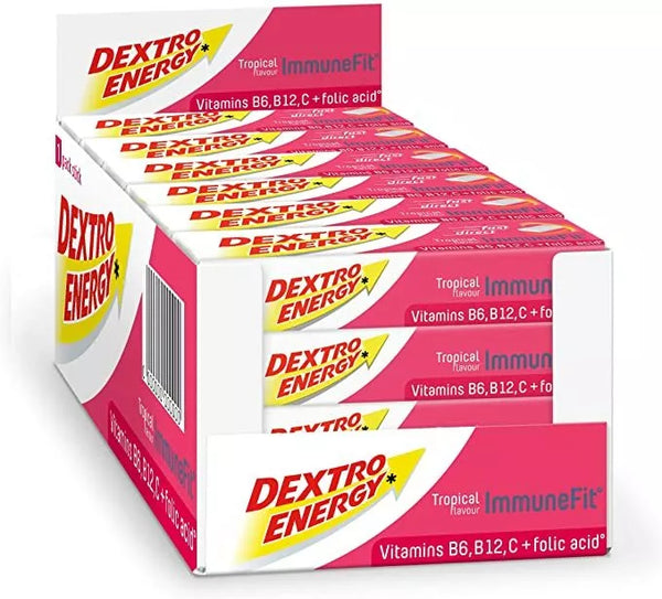 The Dextro Energy Tablets-Tropical (24 pack) by Dextro Energy offers a perfect energy boost with highlighted vitamins B6, B12, C, and folic acid for immune support. The box artfully displays several stacked packets.