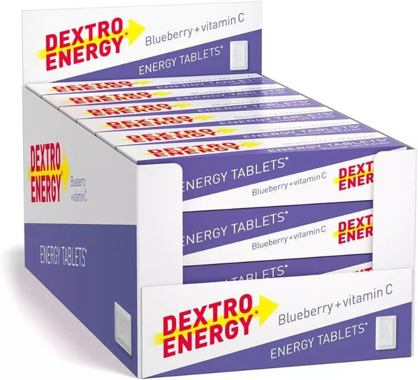 The white box of Dextro Energy Tablets - Blueberry (Pack of 24) prominently features its vitamin-rich content and energy boost benefits, showcasing multiple packages.