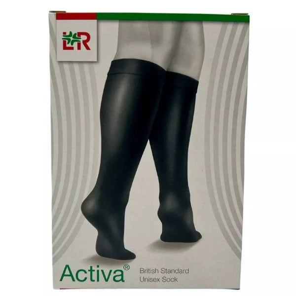 The packaging for Activa Class 2 Unisex Ribbed Support Socks Black (1) features an image of legs wearing sleek, black knee-high socks. Designed in green and red, the box prominently shows the Activa logo in the top left corner. These firm compression socks improve circulation with style.