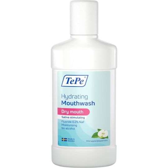 The TePe Hydrating Mouthwash Mild Apple & Peppermint (500ml) is a white bottle from Tepe, ideal for dry mouth. The alcohol-free formula emphasizes saliva stimulation and moisturizing benefits with fluoride, offering a mild apple/mint flavor.