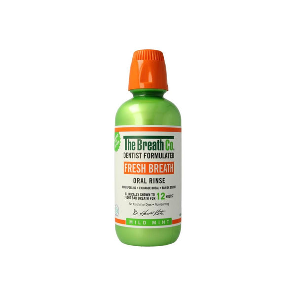 A green bottle of The Breath Co Alcohol Free Mouthwash Mild Mint (500ml) features an orange cap. The label claims Dentist Formulated Fresh Breath and promises to combat bad breath, enhancing your oral care for over 12 hours.
