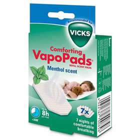 The Vicks Comforting VapoPads Refill Scent Pads (7 count) feature soothing menthol, with packaging showing a child sleeping with a teddy bear. Each pad offers 8 hours of serene breathing and is compatible with Vicks humidifiers for enhanced comfort.